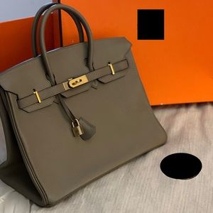 Etoupe Togo leather 35mm, palladium hardware